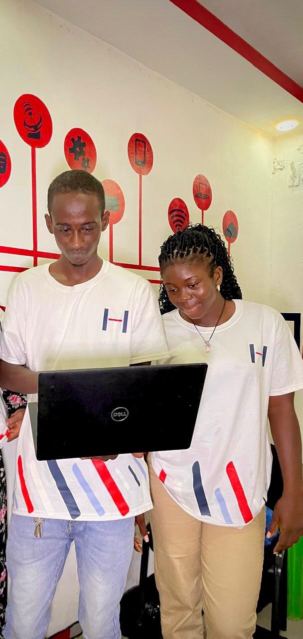Two engineers reviewing code together