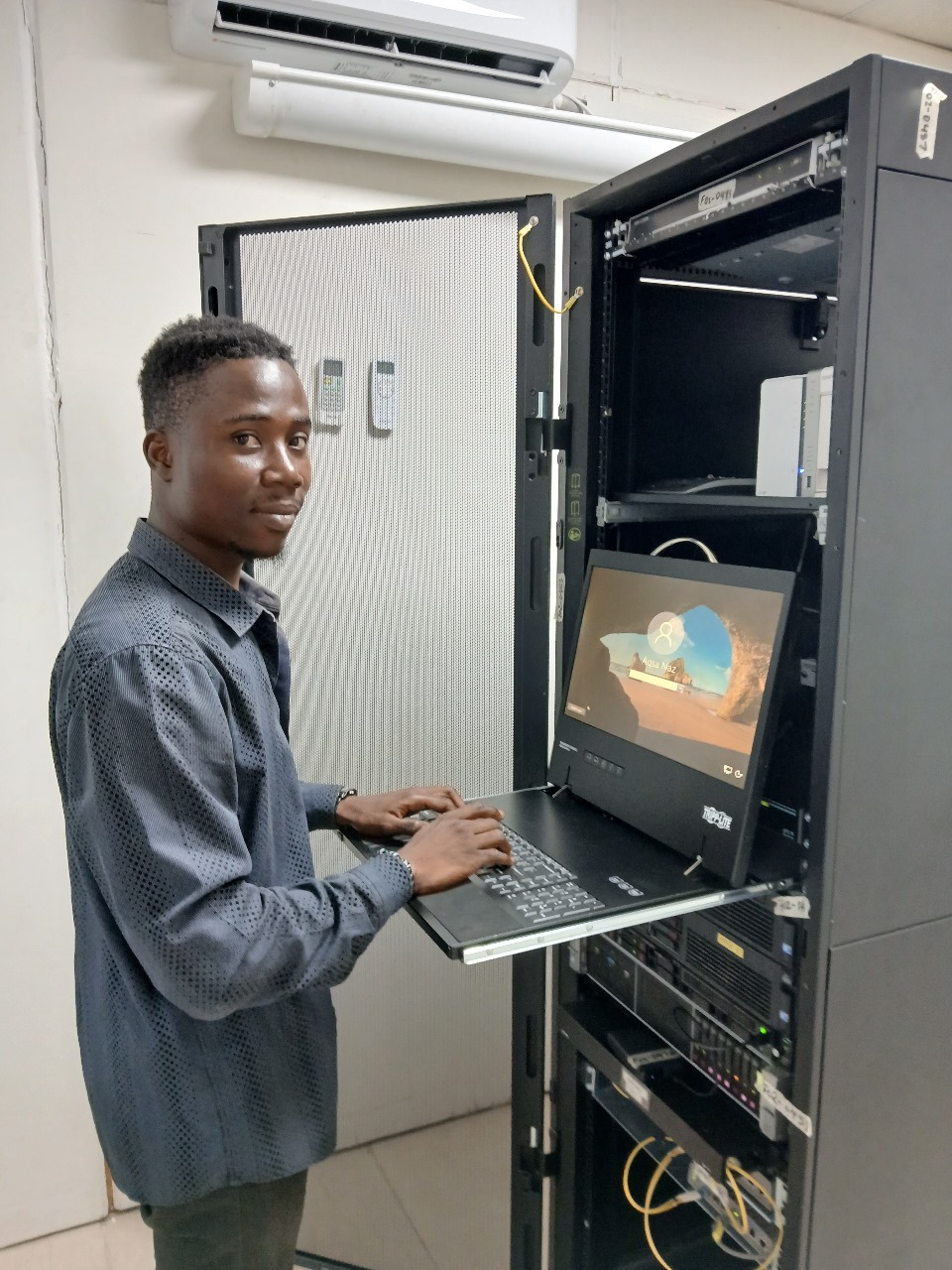 Infrastructure engineer at server rack